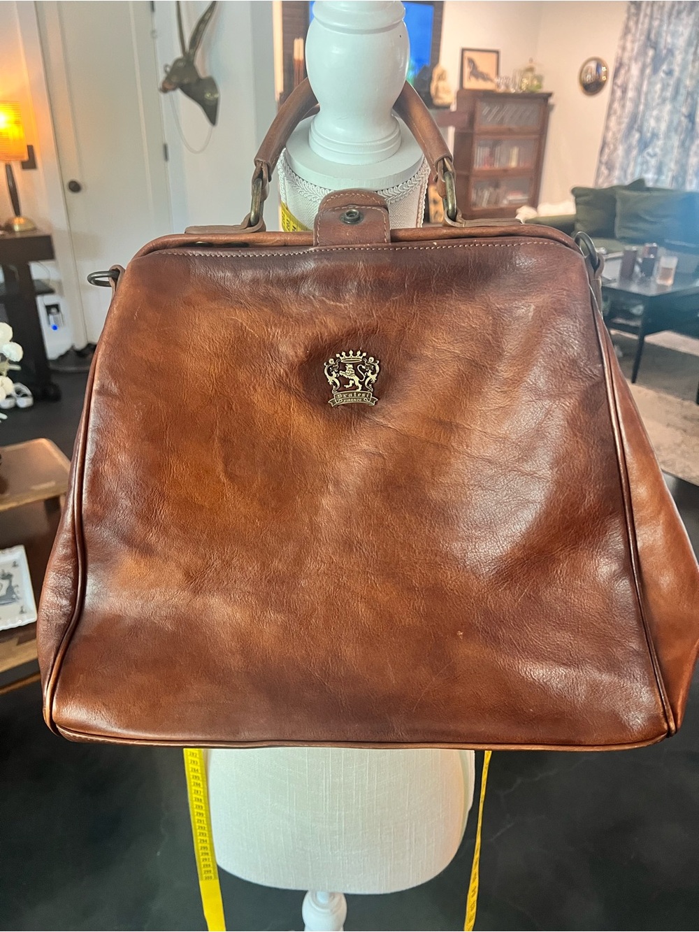 Brown Leather Men's Briefcase with Metal Crest Accent